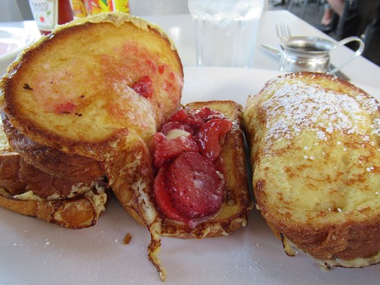 The Cottage La Jolla signature dishes Brioche French Toast
Morning Glory Sandwich
All American Breakfast
